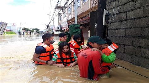 Philippines evacuates thousands as monsoon rains .